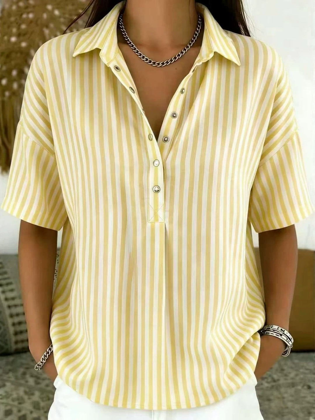 Casual yet chic women's vertical stripe half-button shirt, ideal for spring, summer, or office fashion.