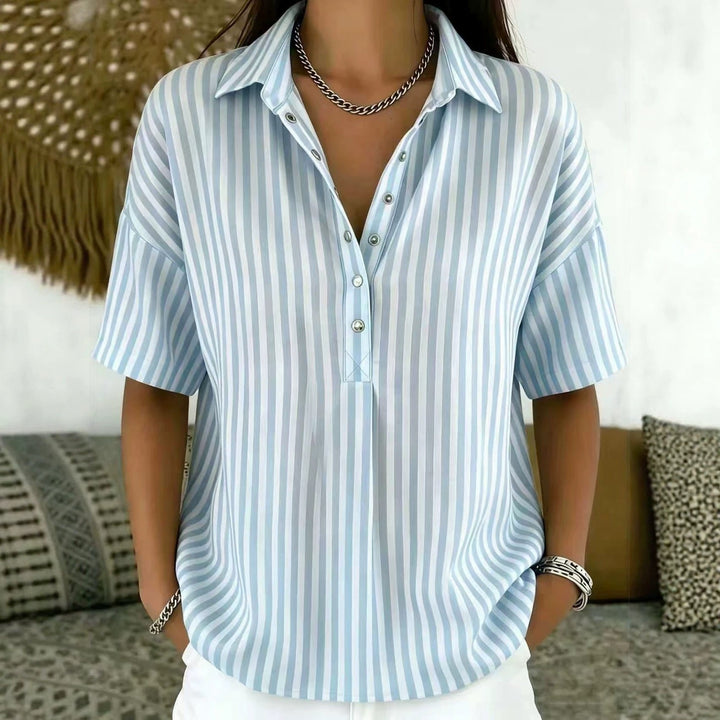 Versatile women's blouse: vertical stripes, half-button, relaxed fit. Ideal for spring, summer & office chic.