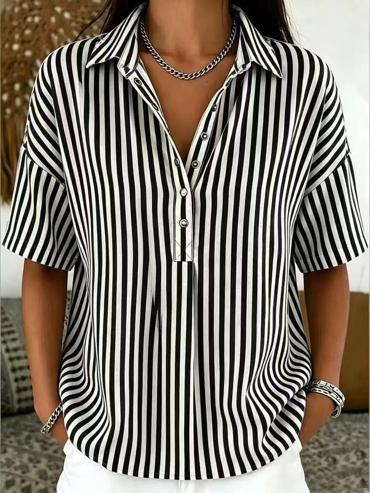 Elegant women's vertical stripe blouse with half-button, a versatile and comfortable top for all seasons.