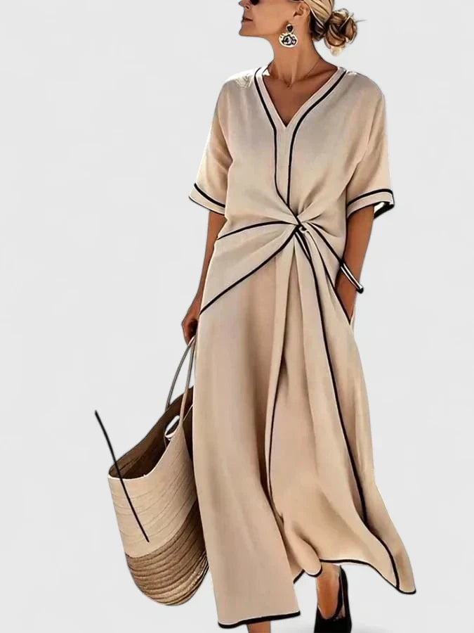 Elegant women's vertical stripe summer dress, relaxed fit & flowy. Perfect lightweight resort wear or vacation dress.