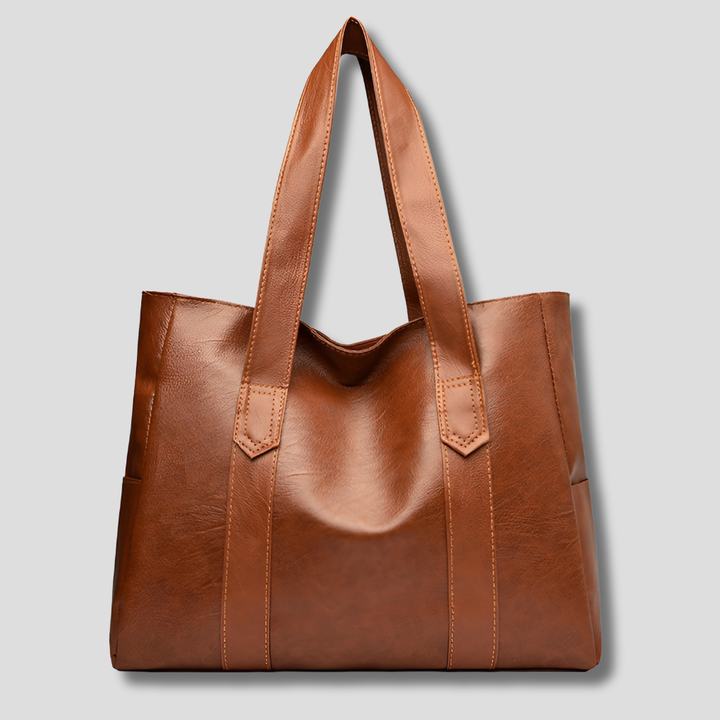 Elegant women's vintage design tote bag with sturdy handles, perfect for daily use & a classic fashion accessory.