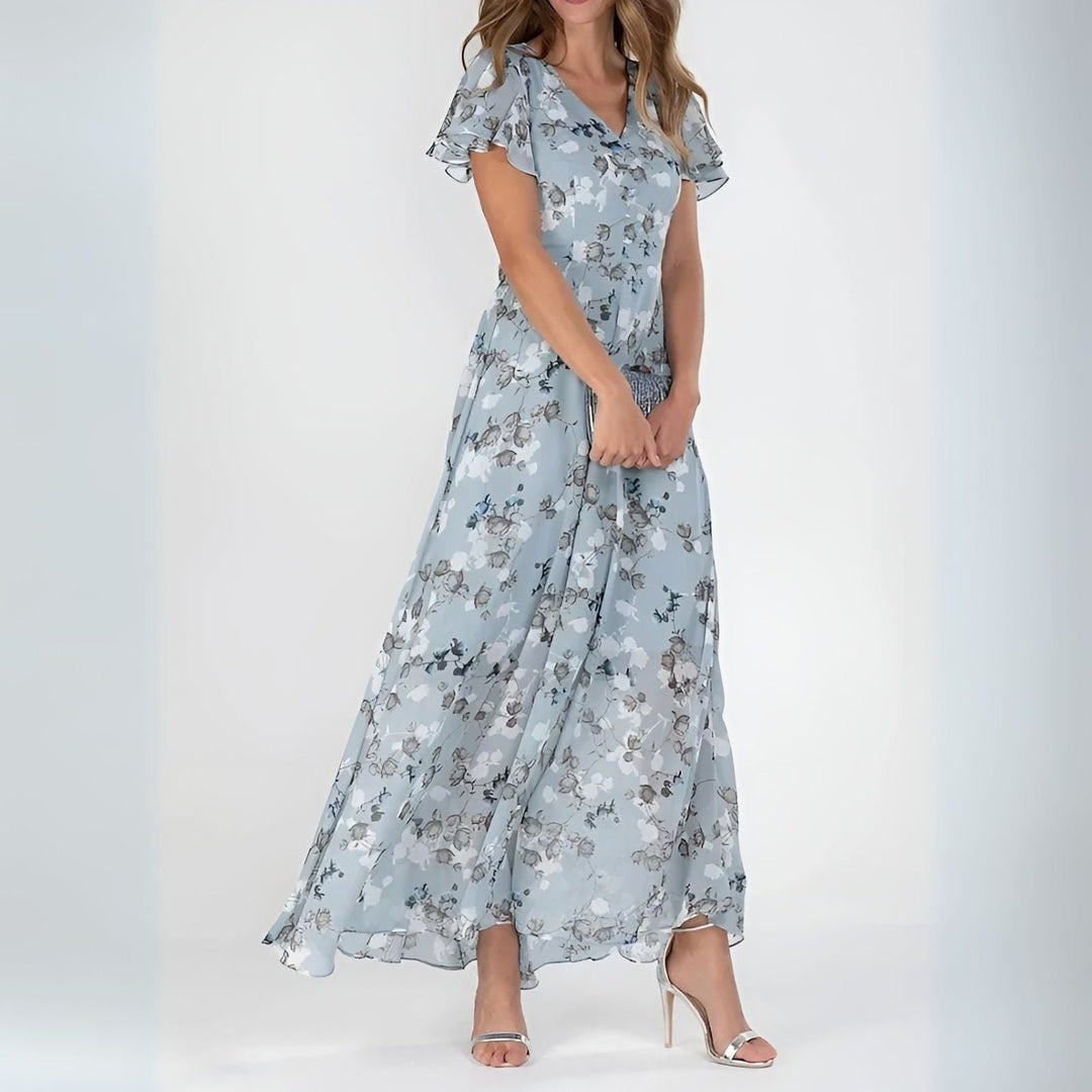 Flowing women's floral maxi dress with watercolor print, comfortable and long, ideal for romantic summer events.