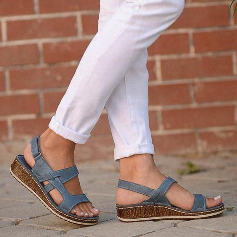 Chic women's wedge sandals, offering comfortable support for all-day summer fashion and casual elegance.