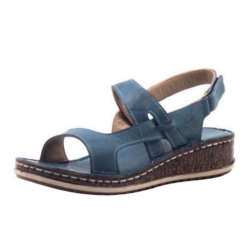 Elegant ladies' summer wedge sandals, combining chic style with comfortable design for warm weather fashion.