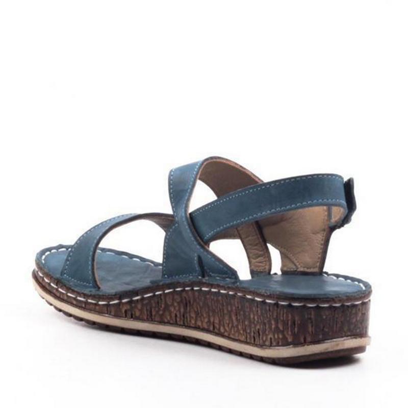 Trendy women's wedge sandals, a chic summer footwear choice for elegant comfort and fashionable warm-weather outfits.