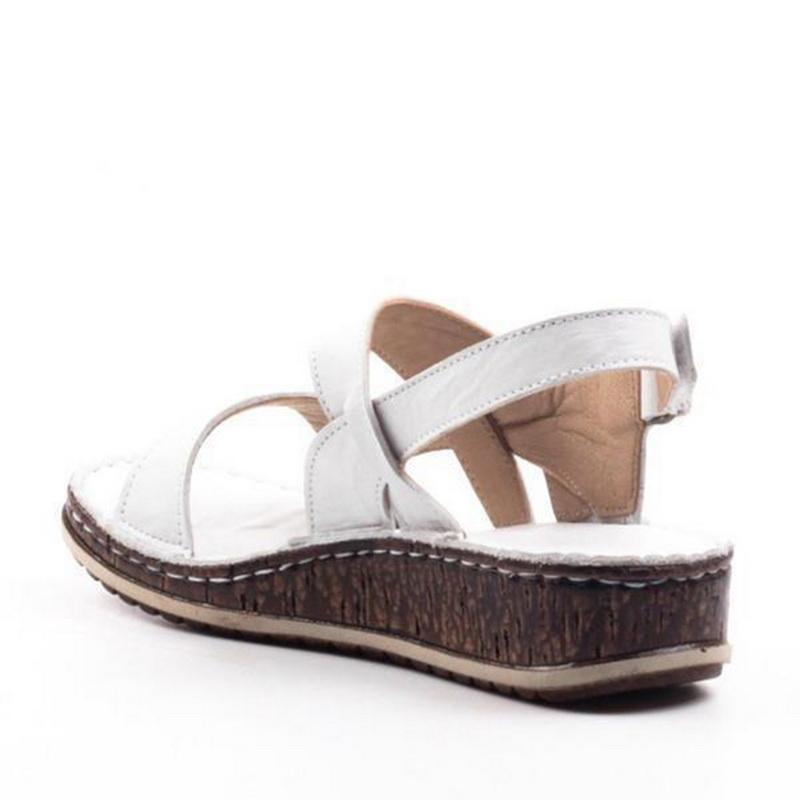 Chic & elegant women's wedge sandals, elevating your summer style with comfortable platform footwear.