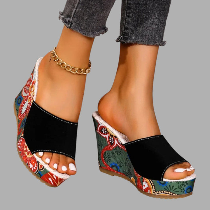Fashionable women's elegant wedge sandals, offering stylish elevation and comfort. Ideal summer footwear.