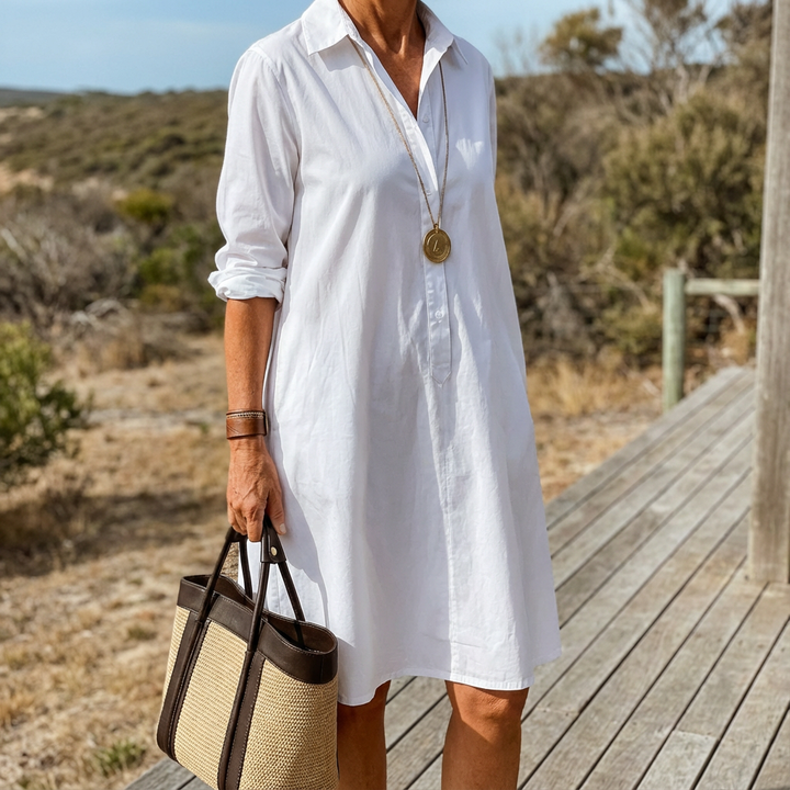 Versatile women's elegant white midi dress with button-down front, ideal for formal or casual sophisticated wear.