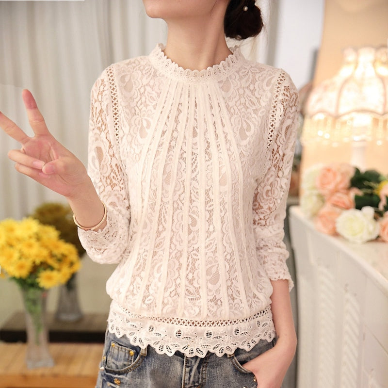 Chic women's black floral lace long sleeve top, ideal for romantic style or versatile autumn fashion.