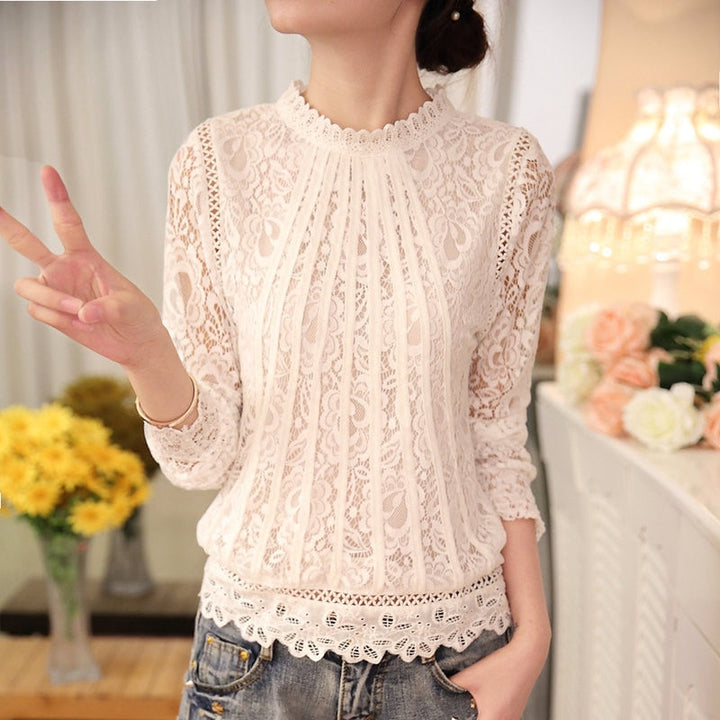 Chic women's black floral lace long sleeve top, ideal for romantic style or versatile autumn fashion.