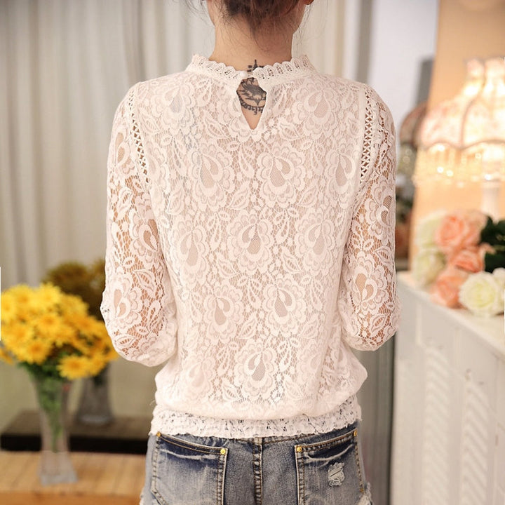 Versatile women's elegant lace long sleeve top, suitable for office attire or a chic special occasion.