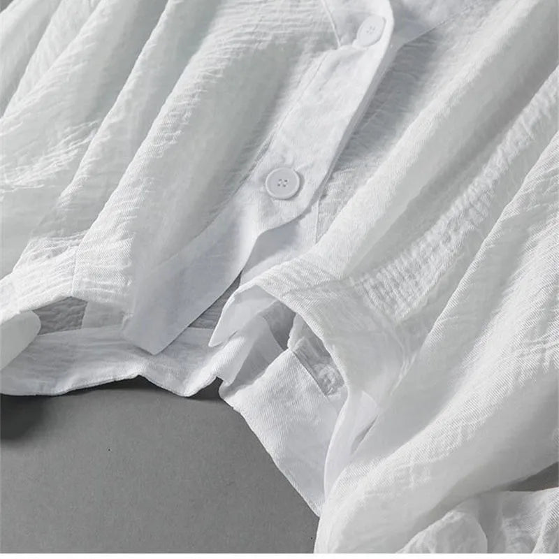 Casual yet elegant women's linen blend top with distinctive balloon sleeves, offering a breathable and versatile summer style.