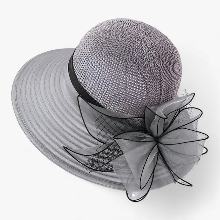 Chic wide brim women's sun hat, perfect for church, garden parties, or elegant summer outings.