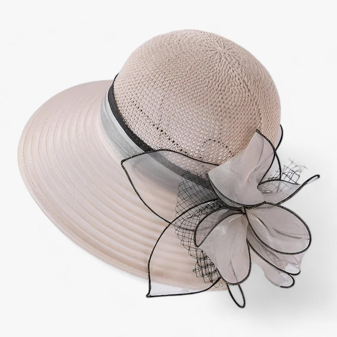 Graceful women's wide brim sun hat, embodying summer elegance. Ideal for formal and casual wear.