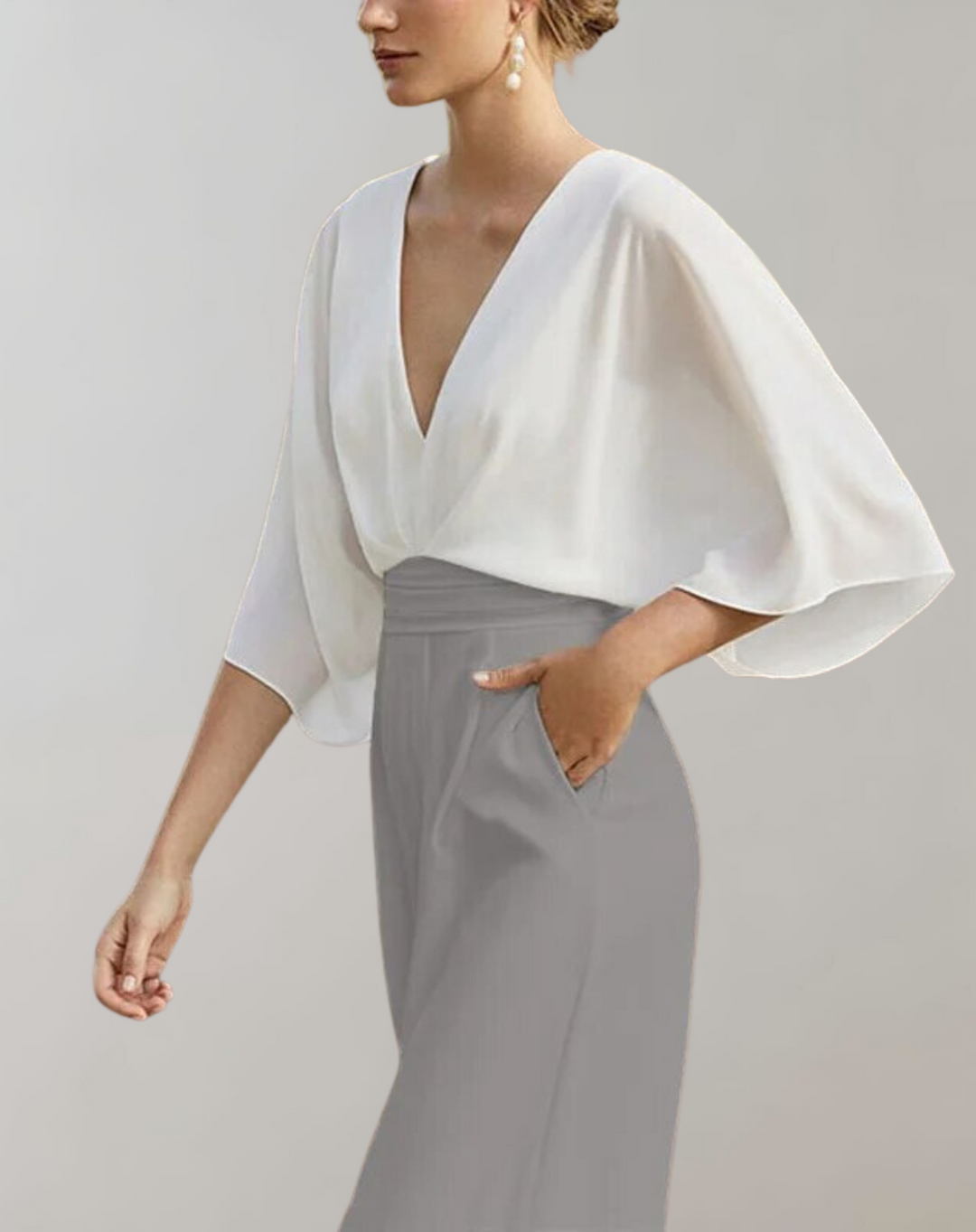 Special occasion women's wide leg jumpsuit. Elegant, formal evening wear with a chic design.