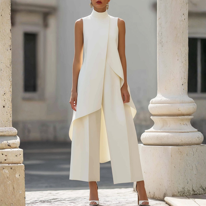 Elegant women's wide-leg jumpsuit with drop waist and high neck. Perfect versatile outfit for formal or casual chic wear.