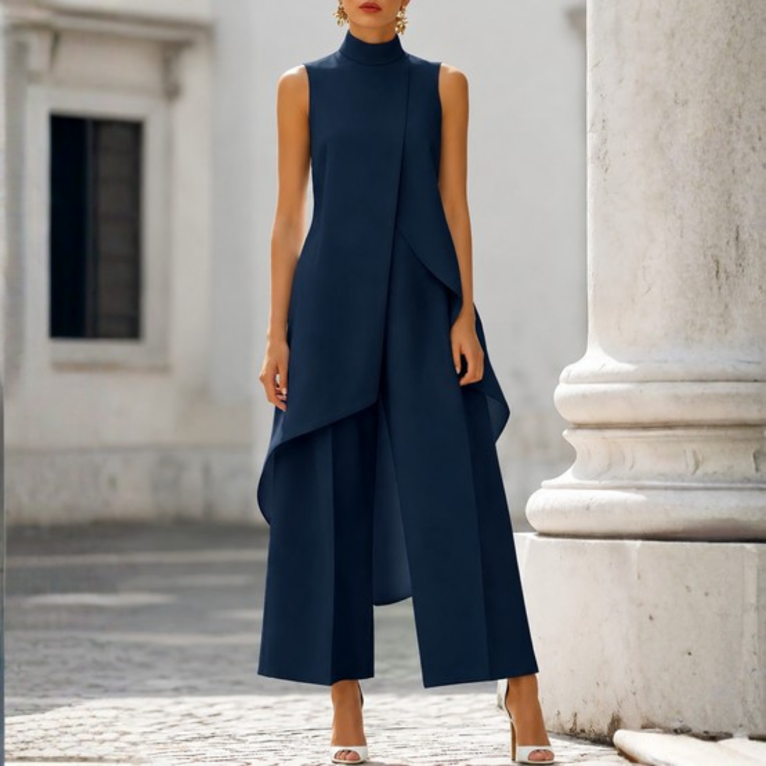 Chic women's sleeveless jumpsuit, wide-leg design with a sophisticated high neck and trendy drop waist silhouette.