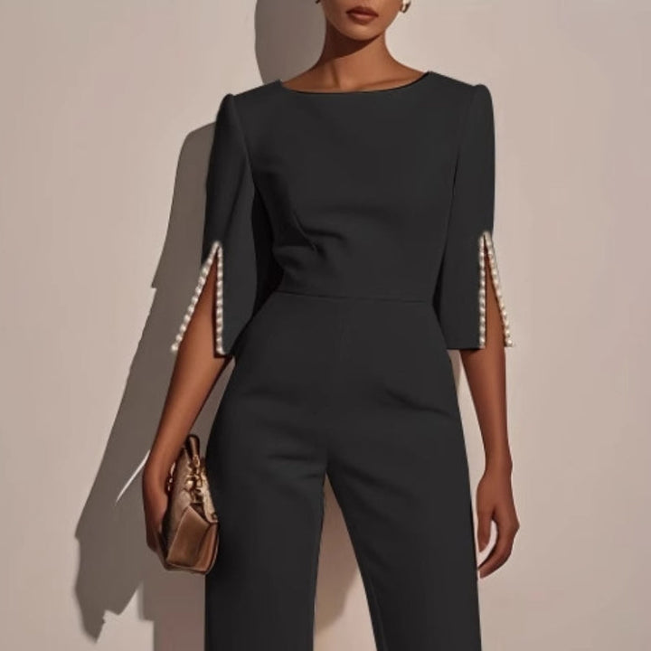 Stylish women's wide leg jumpsuit with elegant pearls, ideal for versatile spring fashion and summer occasions.