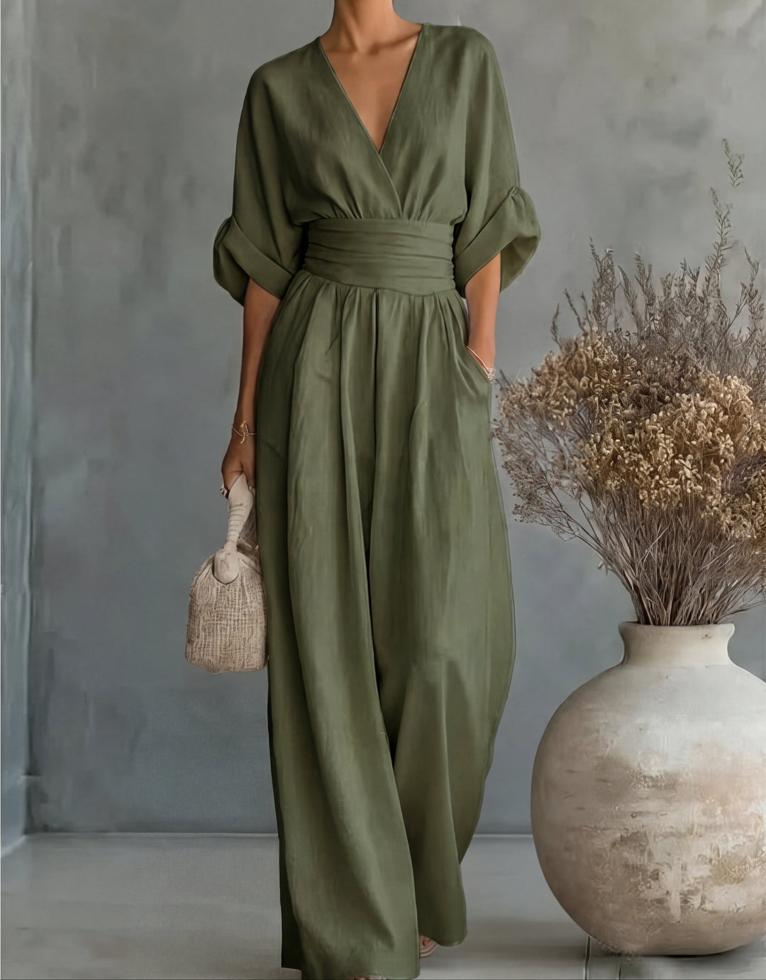 Sophisticated women's wide-leg wrap front jumpsuit, perfect for versatile formal or casual fashion.