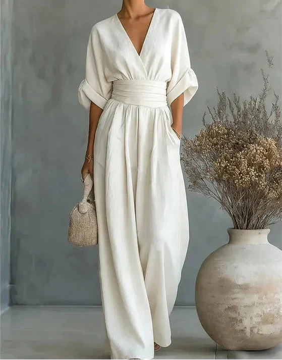 Comfortable women's wide-leg jumpsuit featuring a stylish wrap front, great for any occasion.