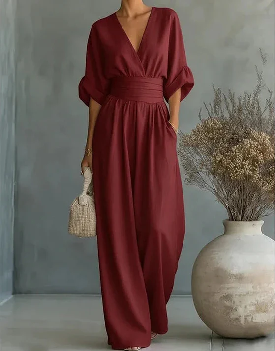 Stylish women's wide-leg wrap front jumpsuit, a versatile and comfortable option for party wear.