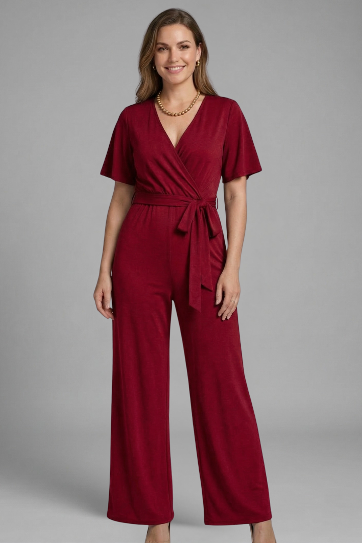 Stylish women's wrap front jumpsuit, perfect for elegant formal or comfortable casual wear. One-piece outfit.