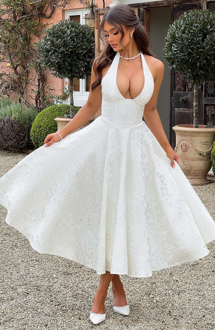 Sophisticated women's white formal wear, a corset halter midi dress, suitable for elegant events.