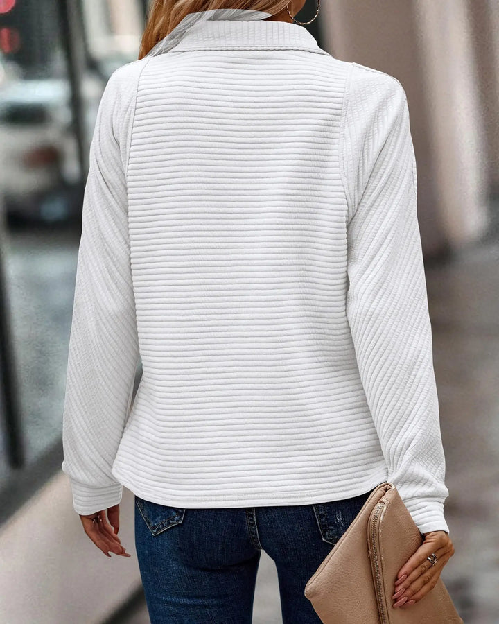 Modern women's V-neck zippered sweater, designed for effortless chic, comfort, and stylish everyday wear.