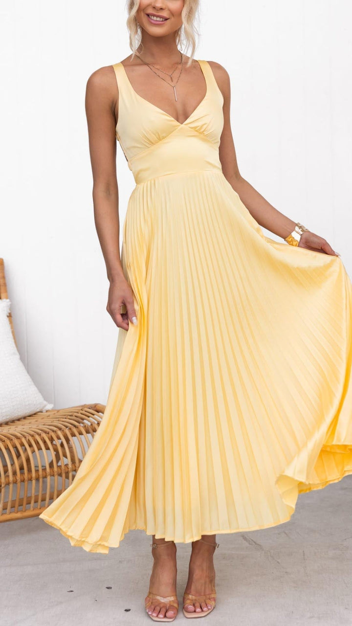 Elegant yellow pleated V-neck midi dress for women, perfect for a summer wedding guest or party.