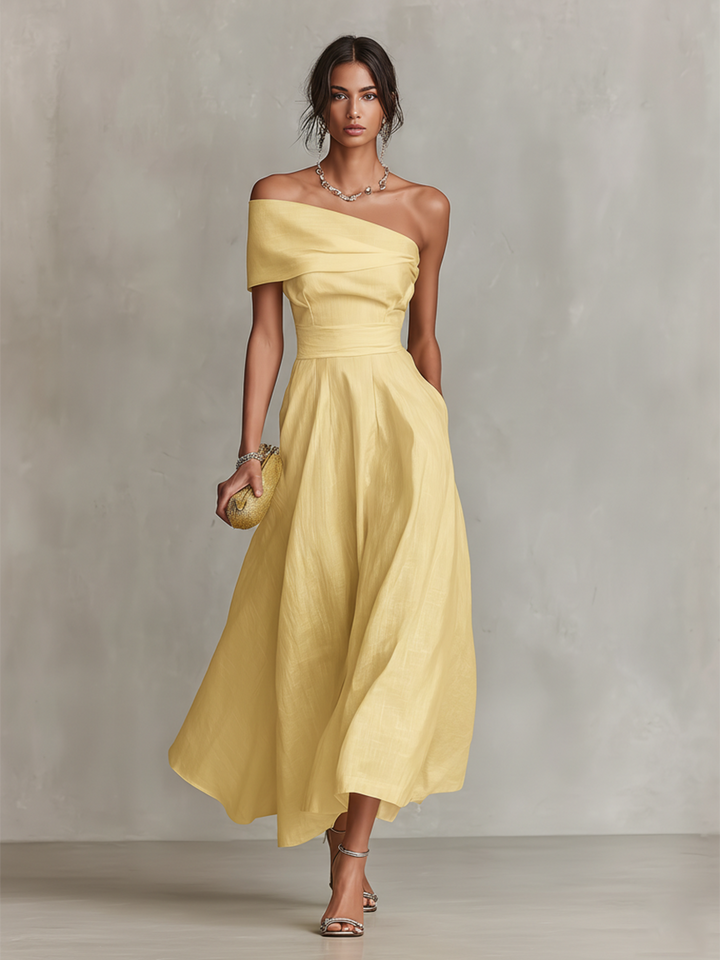 Stylish women's yellow one shoulder midi dress with elegant ruching and A-line skirt. Perfect special occasion dress.