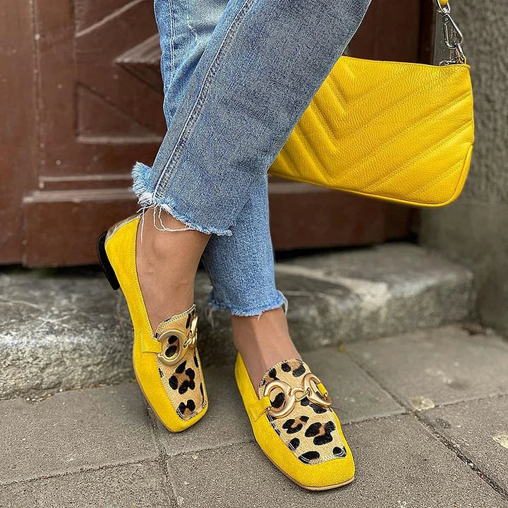 Elegant yellow women's slip-on penny toe loafers, perfect for casual spring fashion & comfortable office wear.
