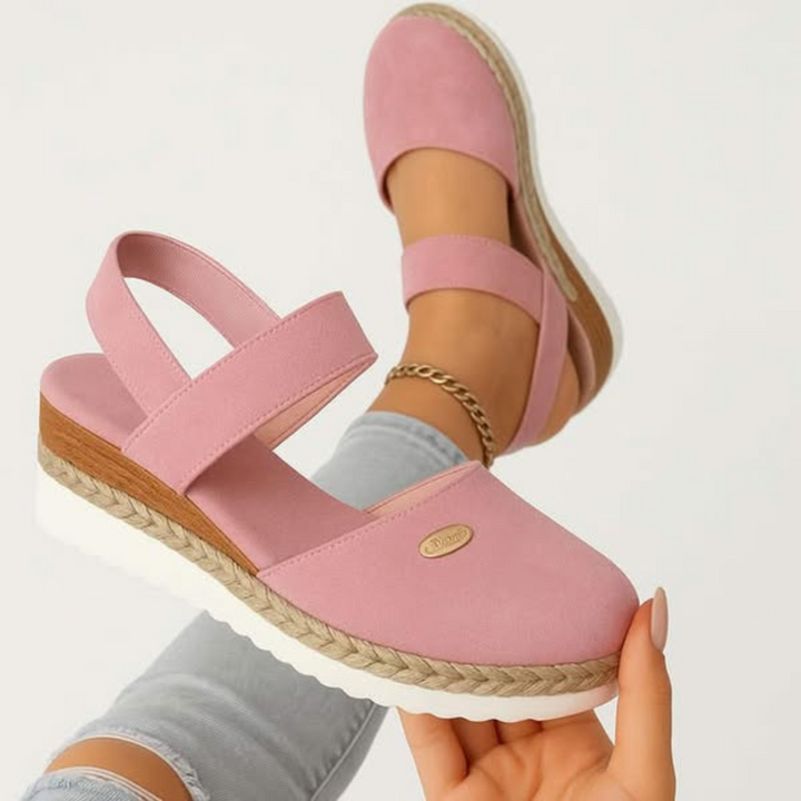 Supportive women's sandals with cushioned footbed for ultimate comfort & walking stability.