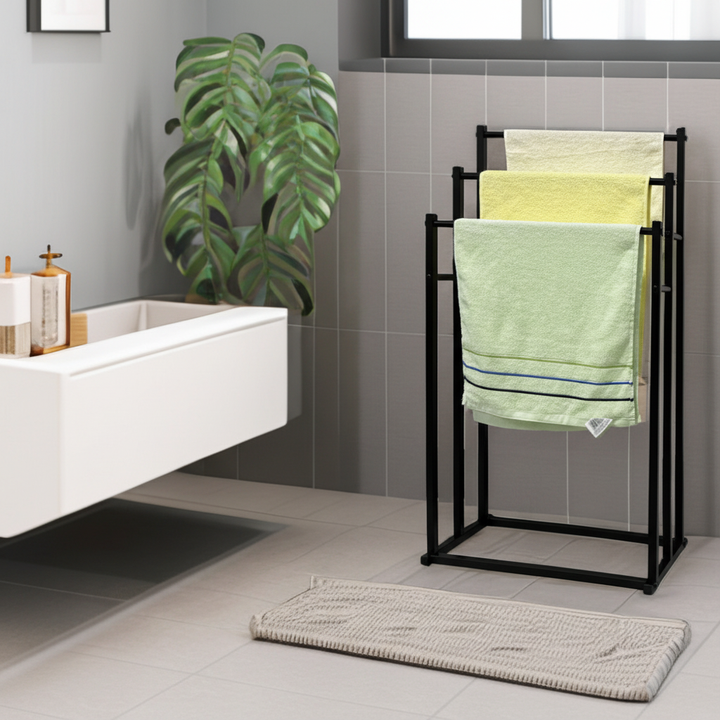 Freestanding steel towel rack for bathrooms, organizing towels neatly and efficiently.