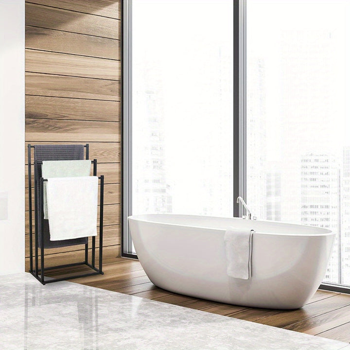 NeatRack freestanding steel towel rack, a compact and sturdy bathroom storage solution for hand towels.