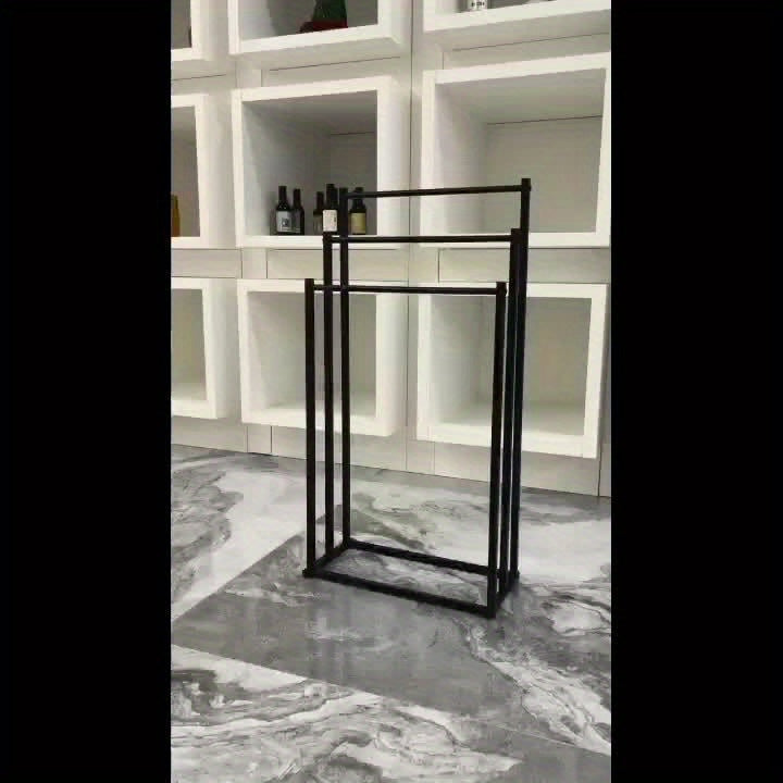 Durable freestanding steel towel rack for bathrooms, ideal for quick drying and stylish organization.