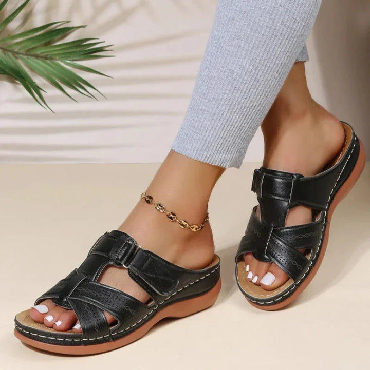 Close-up of premium arch support in women's orthopedic sandals, designed for foot pain relief.