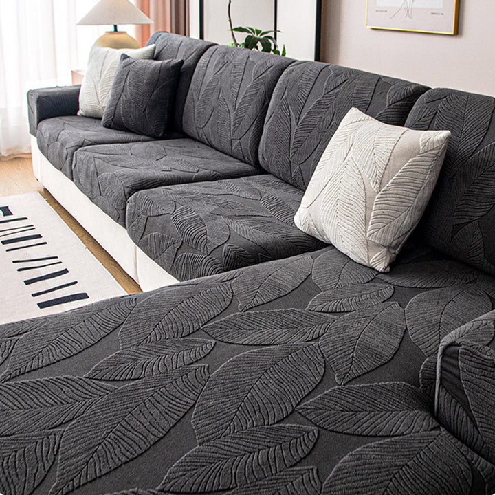 Waterproof & anti-scratch leaf jacquard sofa cover. Pet friendly furniture protector for living room.