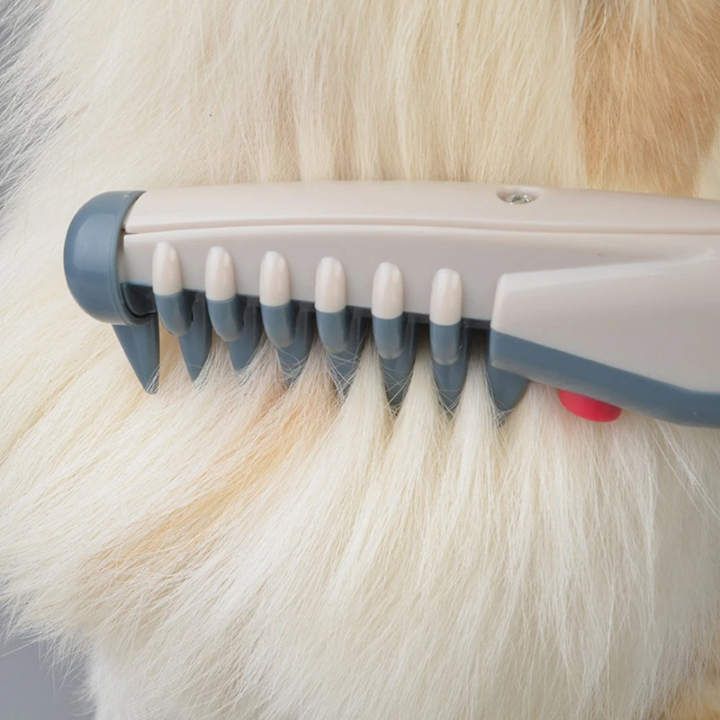 Soft bristle pet grooming brush, ideal for gentle detangling and removing tangles from dog and cat fur.