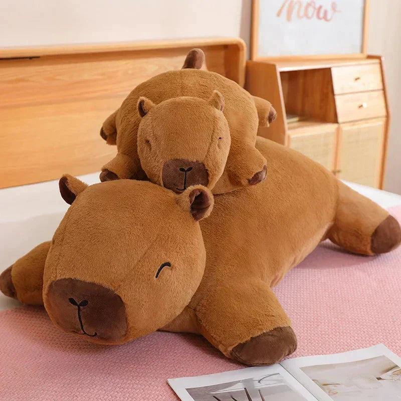 Cozy giant capybara plush, the perfect snuggle buddy & unique animal gift for loved ones.