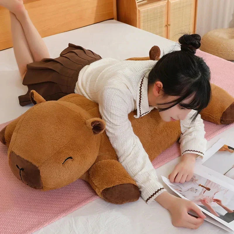 Unisex giant capybara plush toy, a soft cuddle buddy & unique animal gift for adults & kids.
