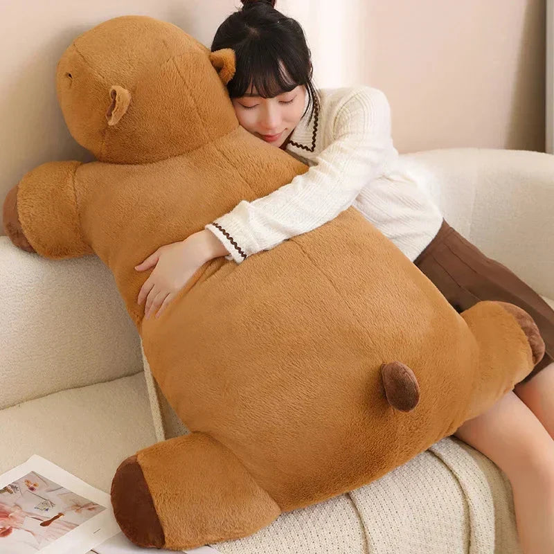 Large capybara plushie, an adorable animal toy & comfort item for snuggles & stress relief.