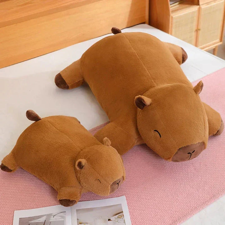 Massive capybara plush, a comfy snuggle buddy & unique gift, perfect for kids or adults.