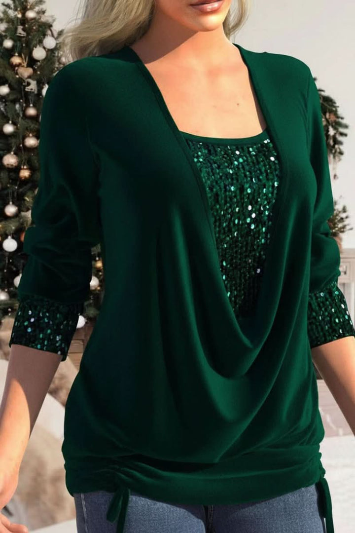 Elegant women's sequin top with a dramatic plunging neckline & long sleeves, ideal for evening glamour.
