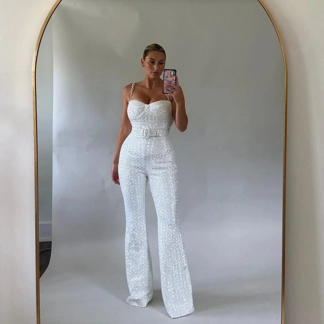 Luxurious women's strapless sequin jumpsuit with a flared leg for a striking evening wear look.