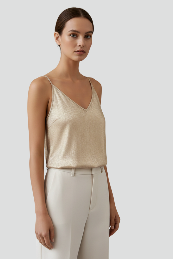 Women's gold V-neck cami top with spaghetti straps, a must-have sleeveless summer fashion layering piece.