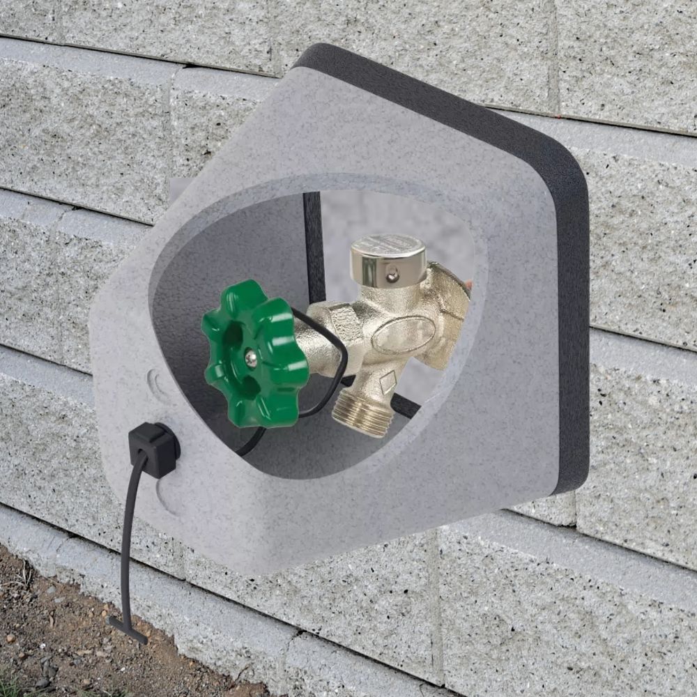 "Gray polystyrene outdoor spigot protector with Velcro strap, providing winter insulation cover for faucets against freeze da