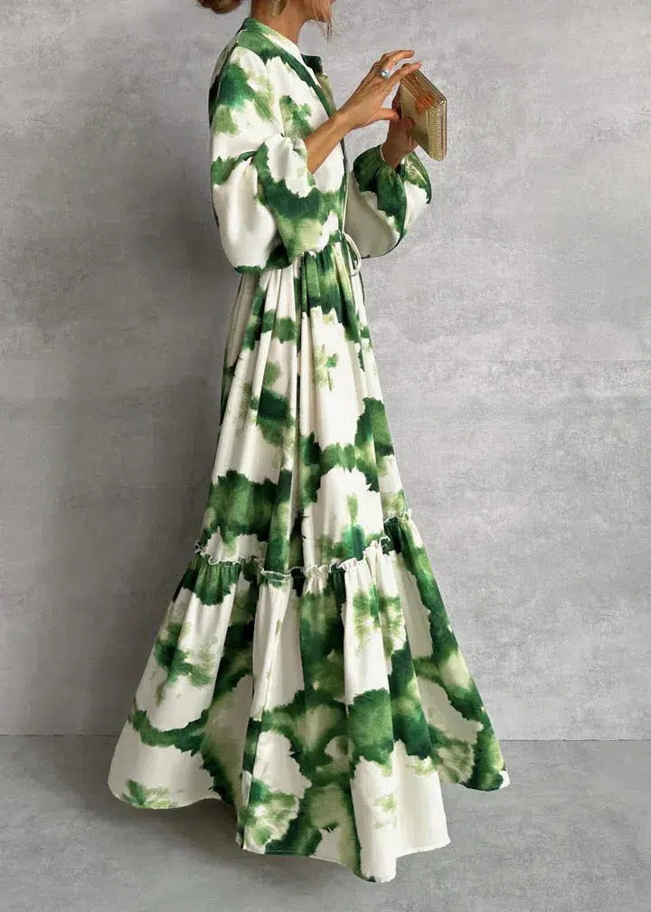 Elegant women's green tie-dye belted maxi dress with long sleeves & tiered skirt, perfect for spring/summer.