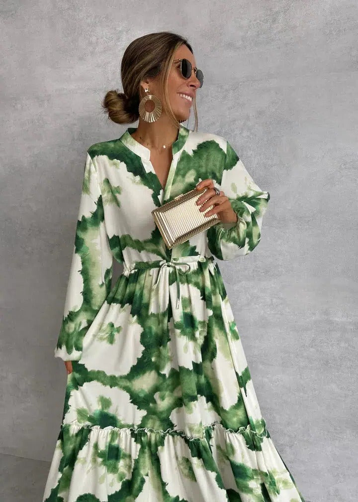 Bohemian green tie-dye long sleeve tiered maxi dress for women, featuring a v-neck and flattering belt.