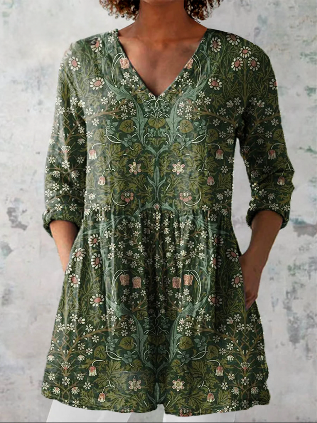 Green women's V-neck tunic blouse with three-quarter sleeves & relaxed fit for casual daily comfort. Spring/Summer.
