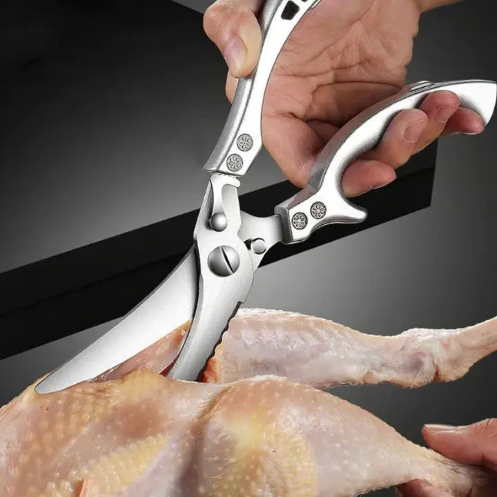 Heavy-duty stainless steel kitchen shears for universal food prep, poultry, fish. Sharp, durable blades.